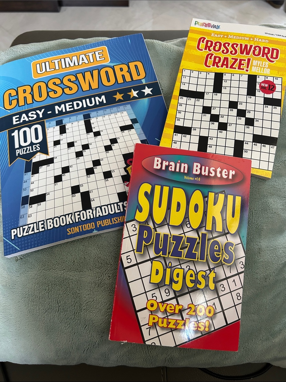 NWOT Set of Sudoku & Crossword Puzzle Books - Blue, Yellow, Red Covers